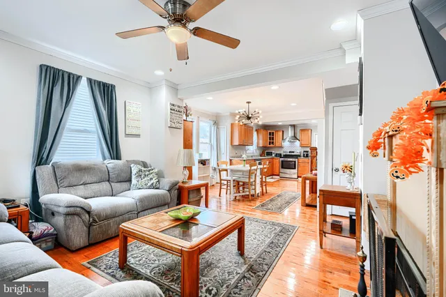 a living room with furniture and a rug