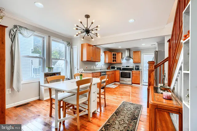 a very nice looking kitchen with a large window