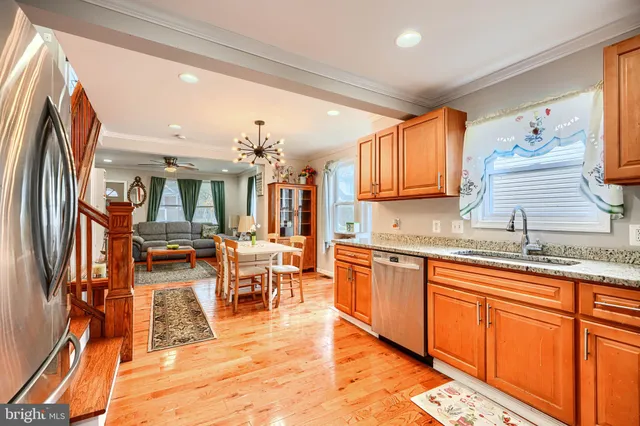 a view of a kitchen with granite countertop lots of counter top space