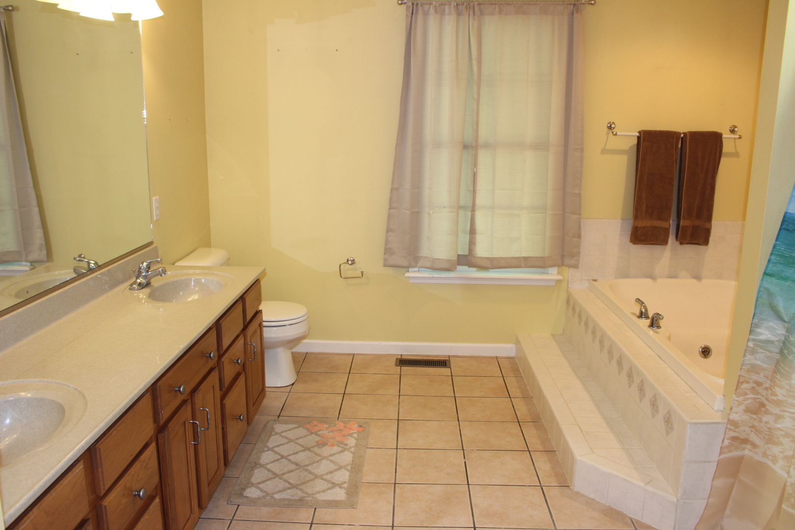 13382 Hickory Grove Road Waynesville, IL 61778 - Photo 28 of 51 a spacious bathroom with a tub sink and mirror