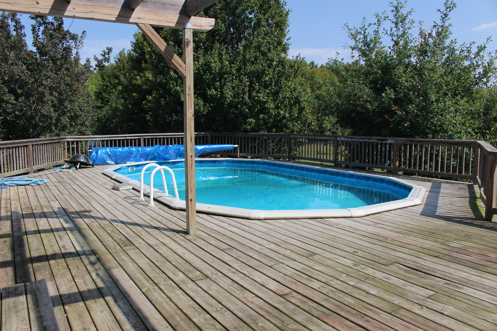 13382 Hickory Grove Road Waynesville, IL 61778 - Photo 3 of 51 a view of a swimming pool with a patio