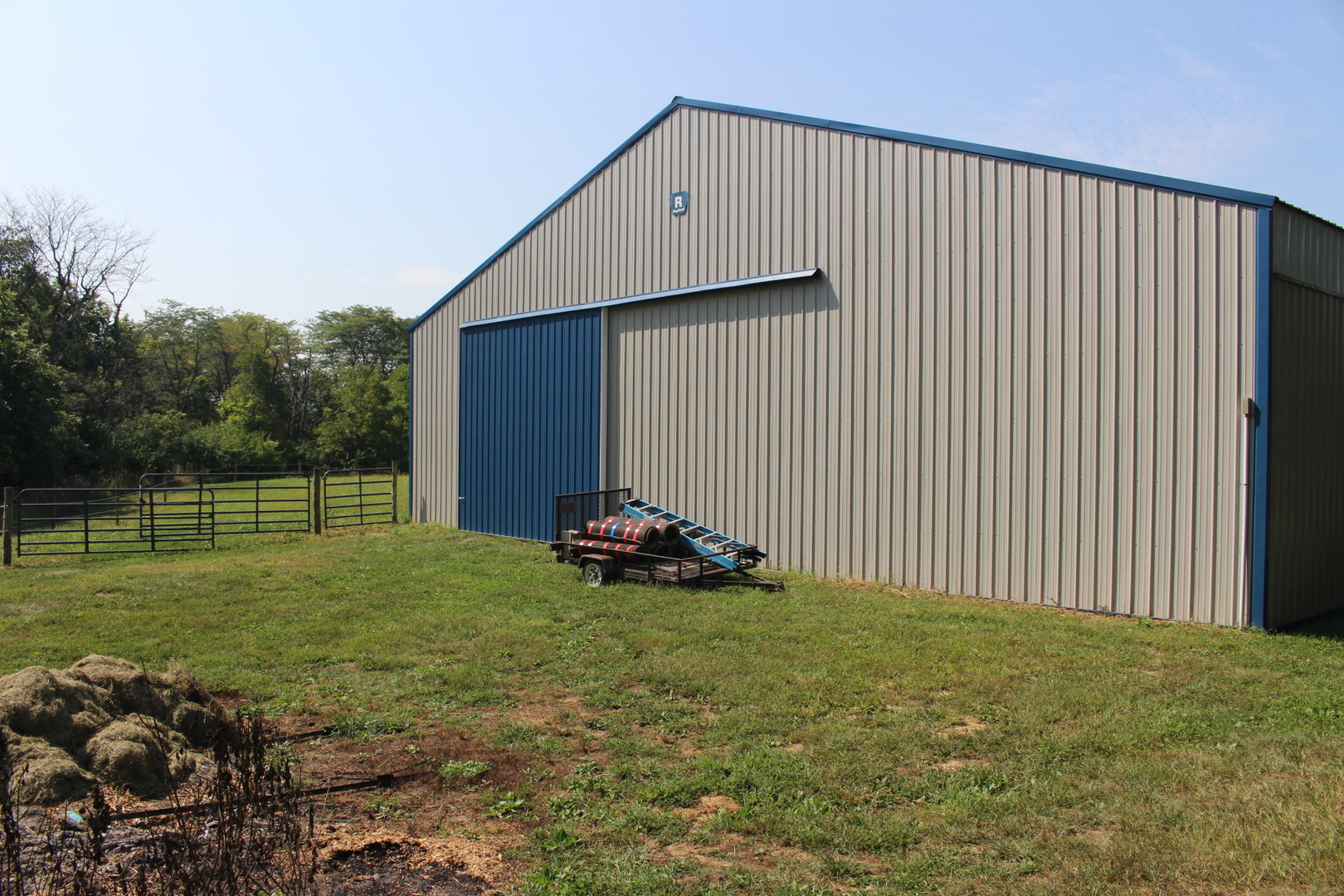 13382 Hickory Grove Road Waynesville, IL 61778 - Photo 41 of 51 a backyard of a house with wooden fence