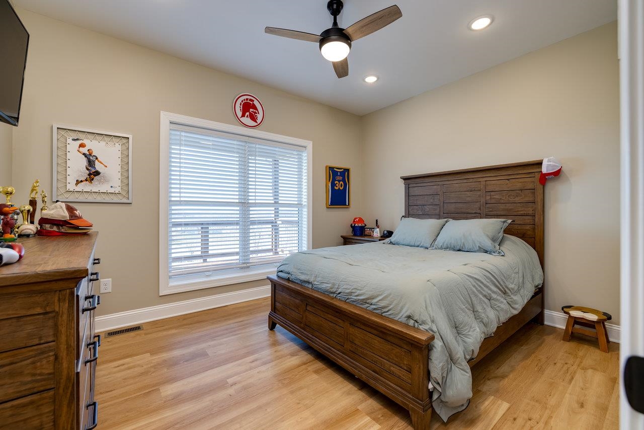 1776 Old Providence Road Raphine, VA 24472 - Photo 35 of 73 a spacious bedroom with a bed and a window