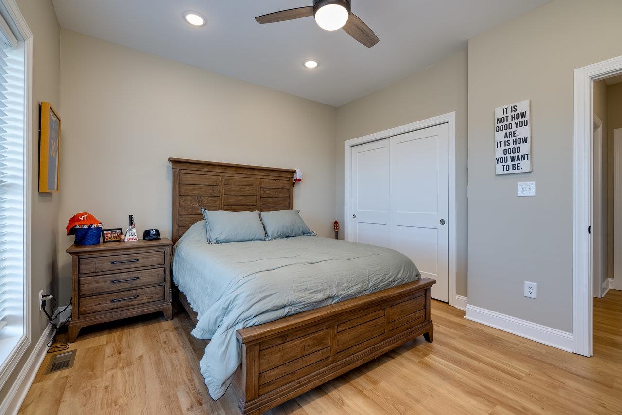 1776 Old Providence Road Raphine, VA 24472 - Photo 36 of 73 a bed room with a bed and a ceiling fan