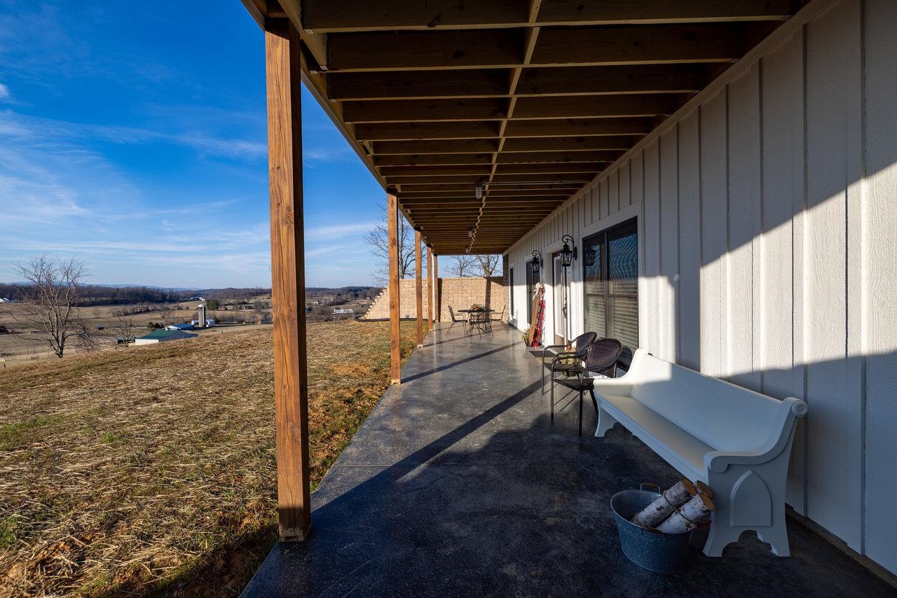 1776 Old Providence Road Raphine, VA 24472 - Photo 60 of 73 a view of a porch with furniture and a yard
