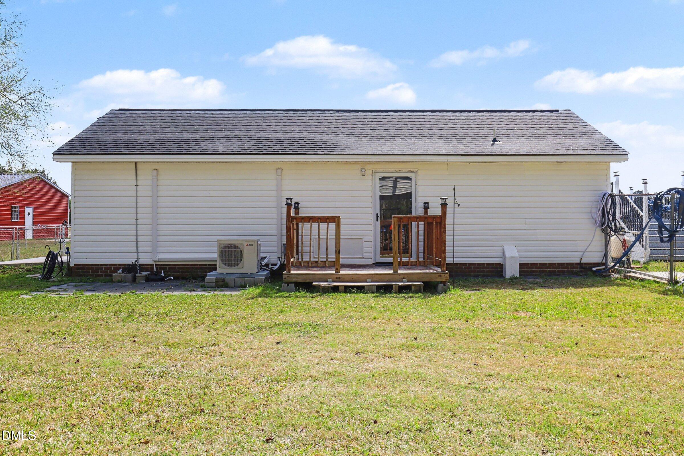 430 Fred Hall Road Stedman, NC 28391 - Photo 61 of 63 a view of a house with swimming pool and porch