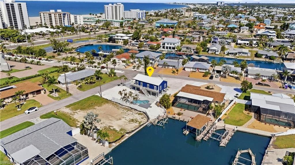 1 Fairview Boulevard Fort Myers Beach, FL 33931 - Photo 34 of 48 an aerial view of a city with lots of residential buildings