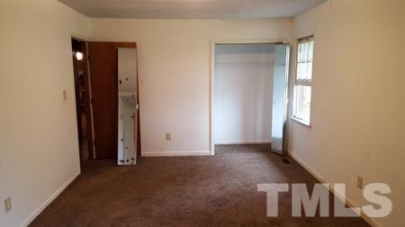 2916 Alron Road Wendell, NC 27591 - Photo 2 of 6 an empty room with windows