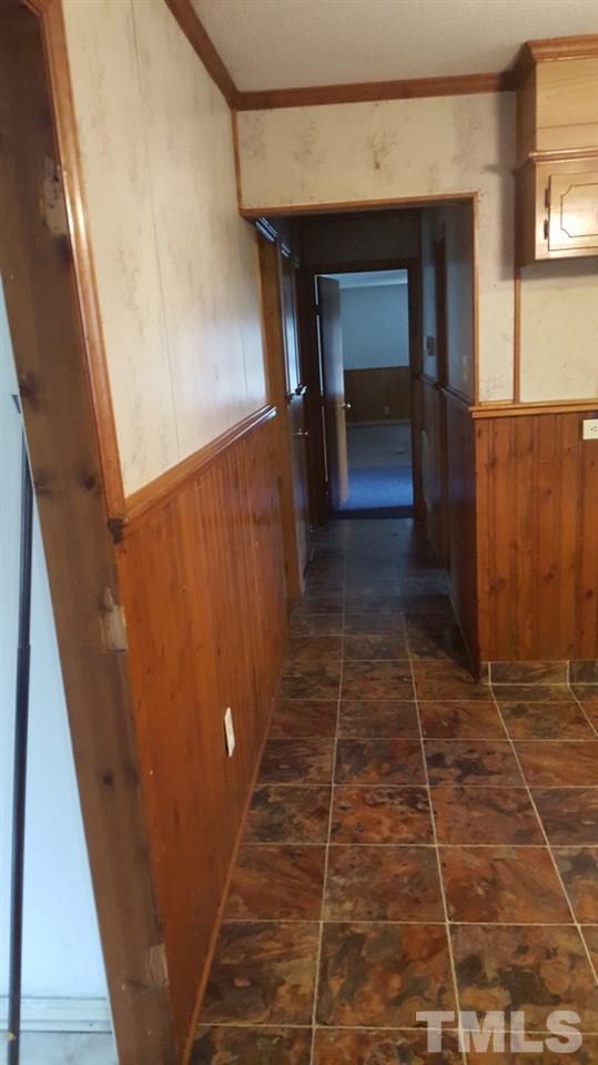 2916 Alron Road Wendell, NC 27591 - Photo 5 of 6 a view of hallway with wooden floor and stairs