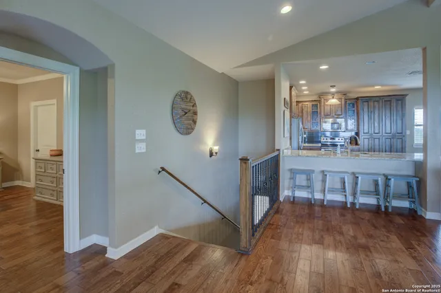 a kitchen with a table and chairs