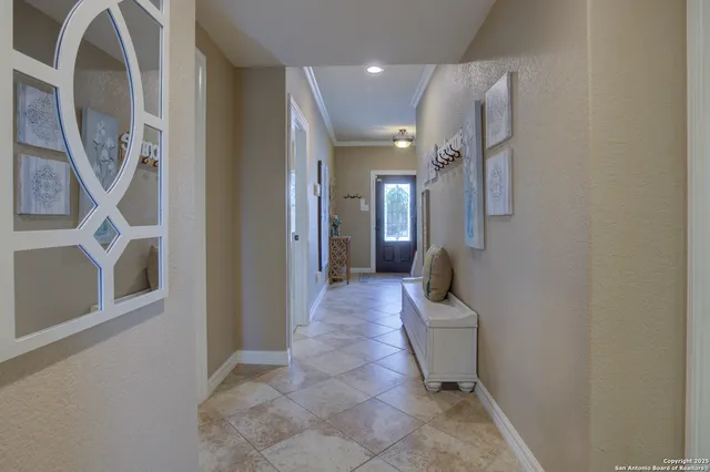 a hallway with a furniture