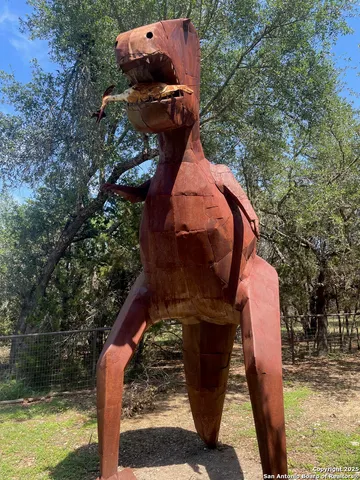 a picture of trees outside of the house