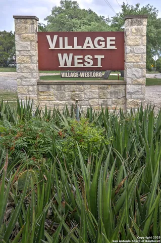 a view of a house with a street