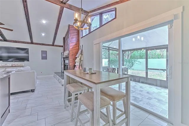 a open kitchen with stainless steel appliances granite countertop a sink and cabinets