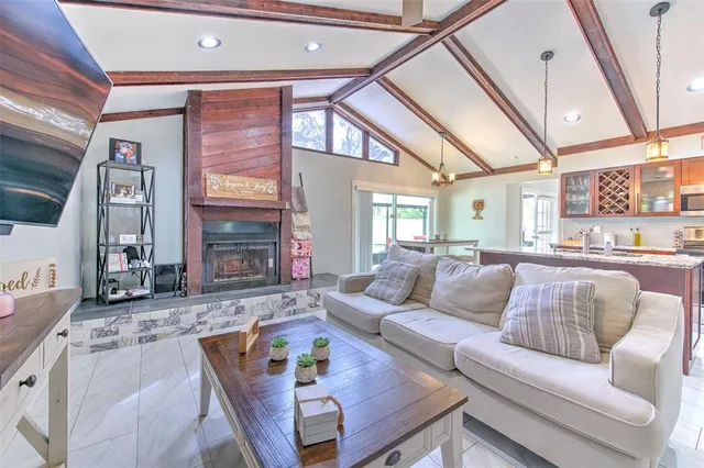 a living room with furniture and a rug