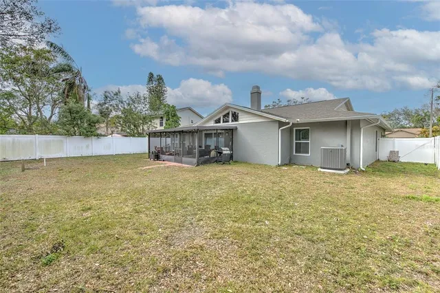 an aerial view of residential house with outdoor space