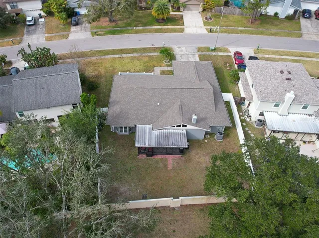a view of a park with swings and slides