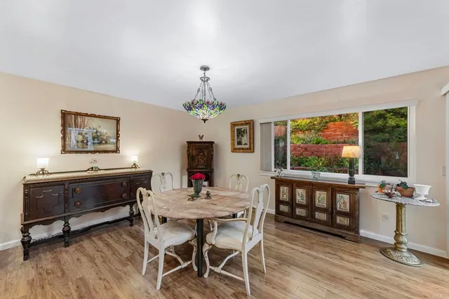 a bed room with a bed and a large mirror