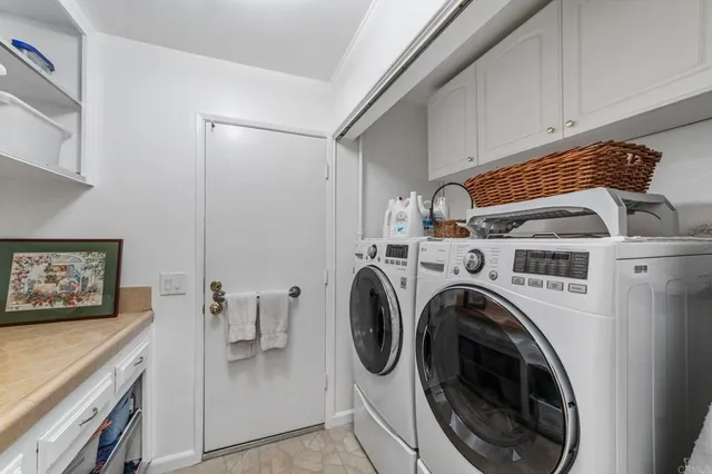 a bathroom with a glass door shower
