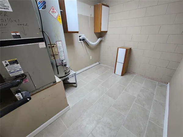 a view of utility room with empty racks