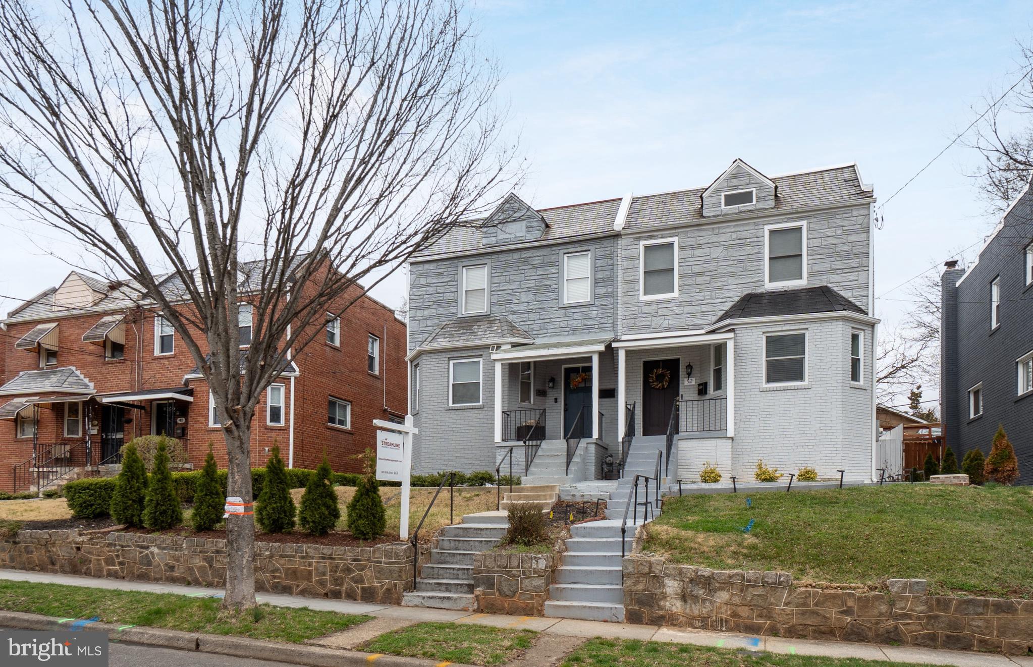 50 53rd Street Southeast Washington, DC 20019 - Photo 2 of 35 a front view of a house with garden