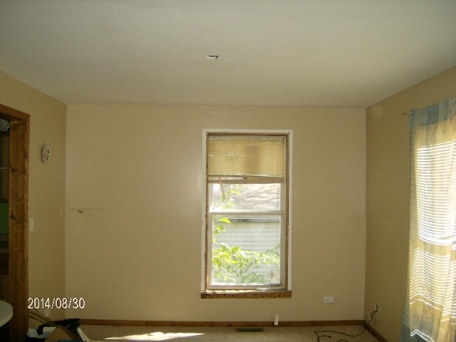 2106 Arthur Avenue Lockport, IL 60441 - Photo 2 of 12 an empty room with windows