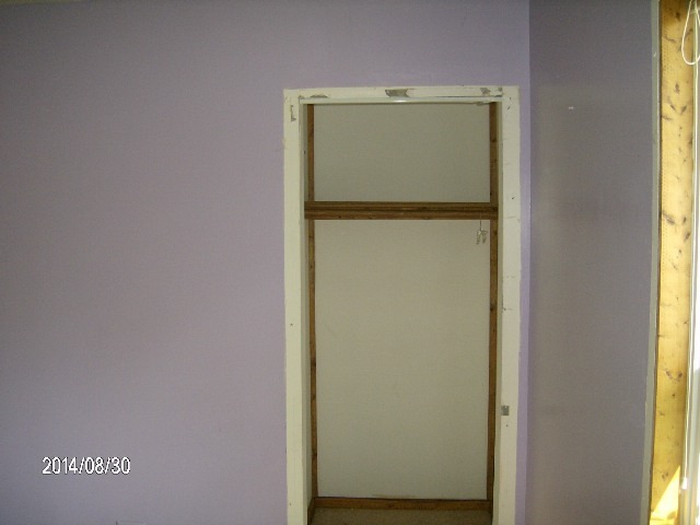 2106 Arthur Avenue Lockport, IL 60441 - Photo 6 of 12 a bathroom with a glass door and a window
