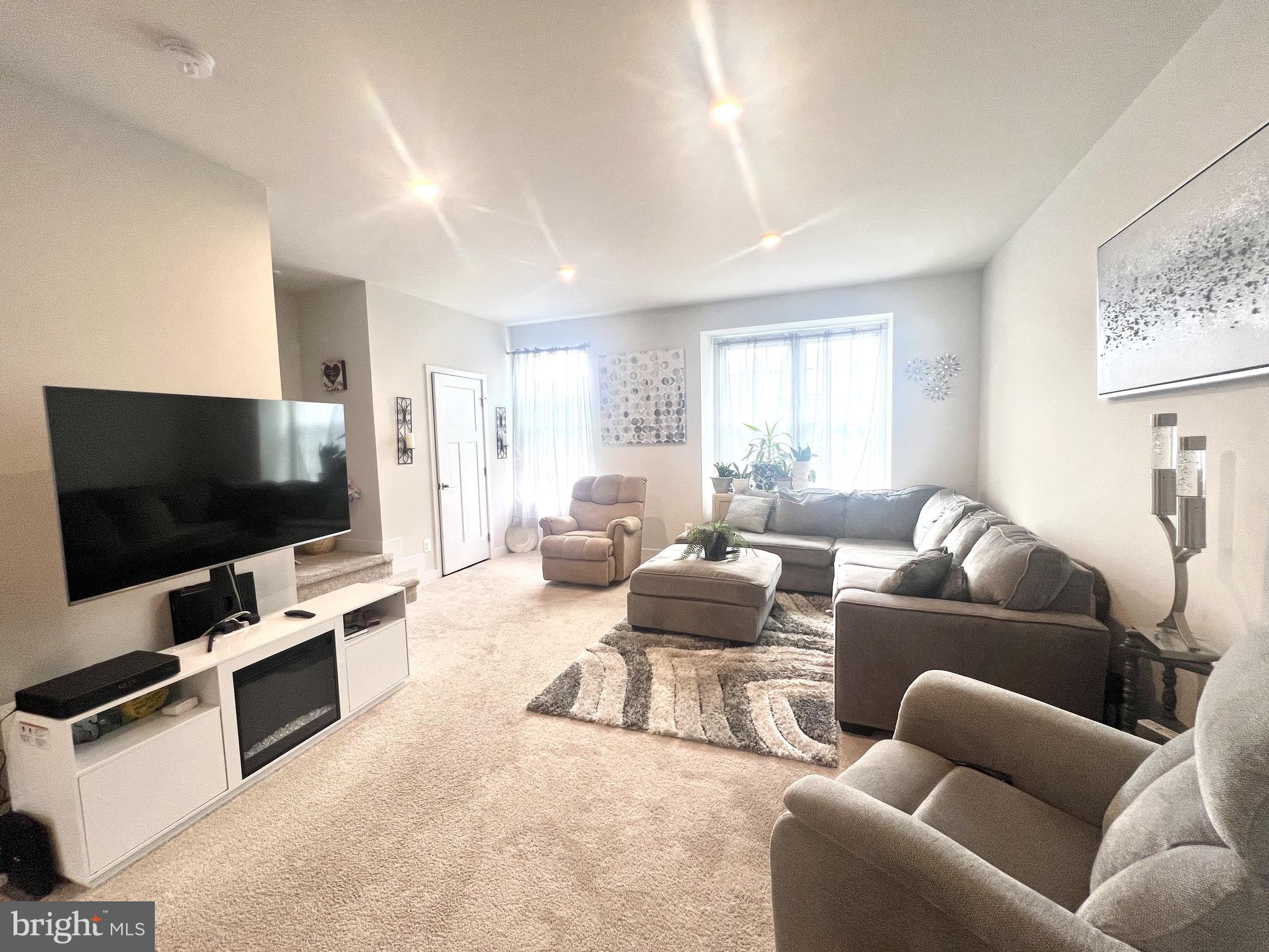2060 Rivers Drive Newark, DE 19702 - Photo 12 of 25 a living room with furniture and a flat screen tv