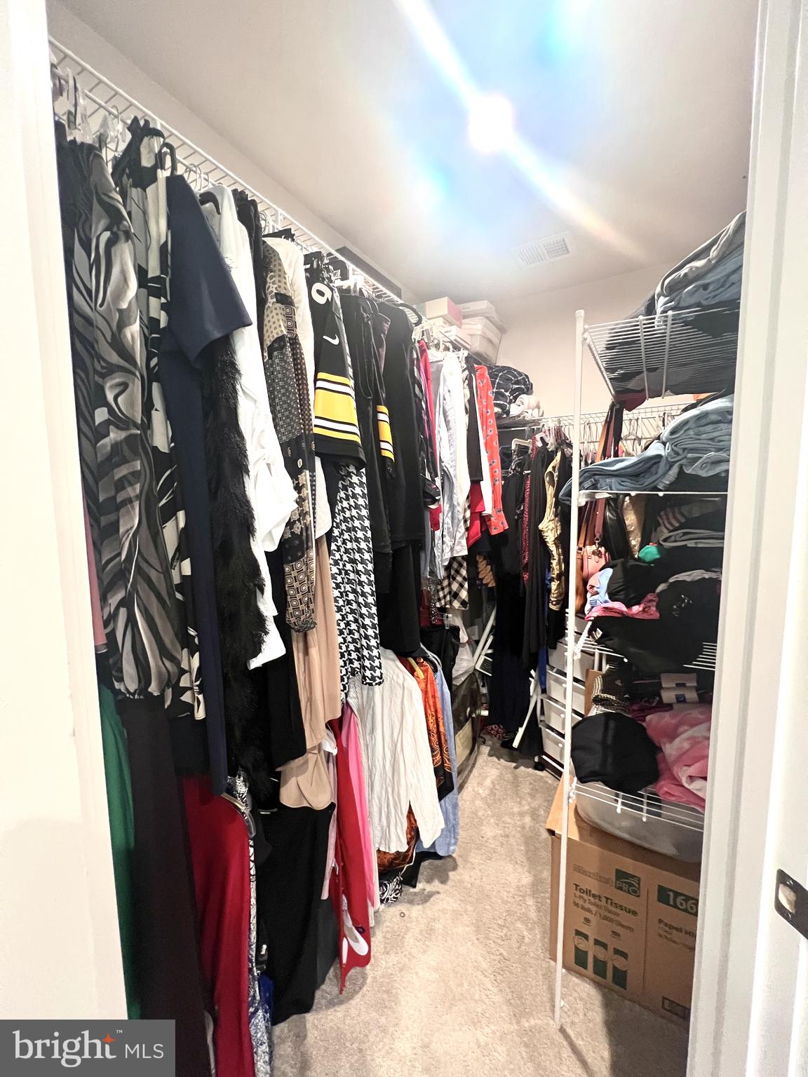 2060 Rivers Drive Newark, DE 19702 - Photo 19 of 25 a view of walk in closet with clothes and shoes