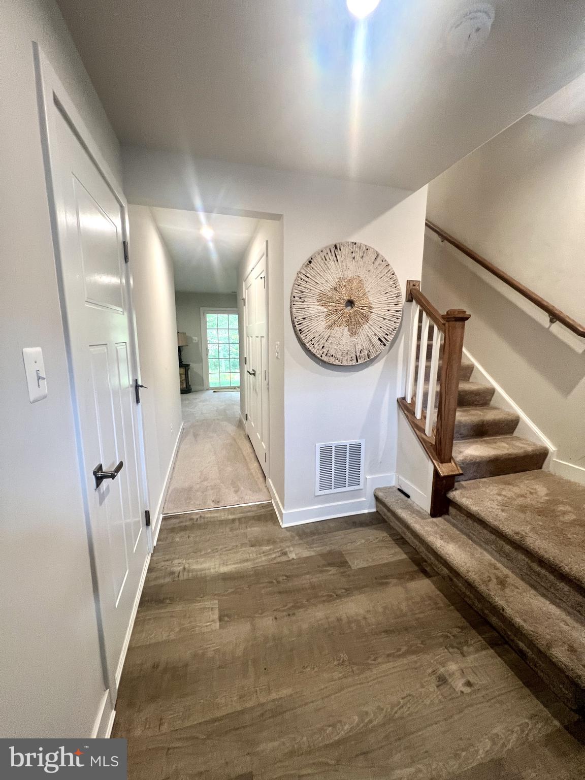 2060 Rivers Drive Newark, DE 19702 - Photo 6 of 25 a view of a hallway with staircase