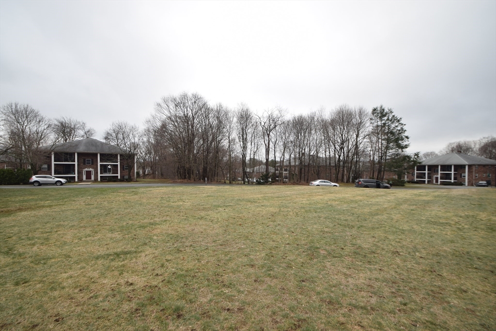 13 Walker Road, Unit 12 North Andover, MA 01845 - Photo 17 of 18 a view of a house with backyard and trees