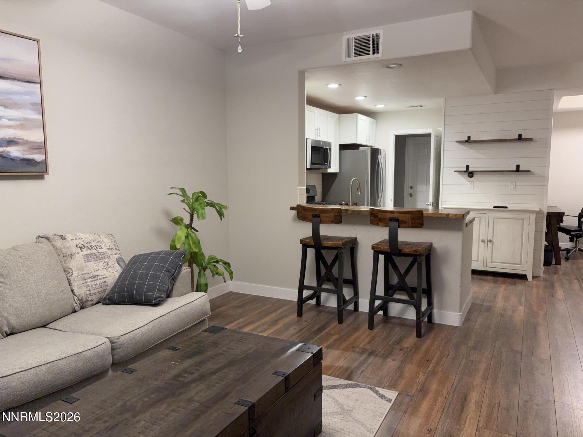 900 South Meadows Parkway, Unit 3613 Reno, NV 89521 - Photo 4 of 13 Living Room/Kitchen