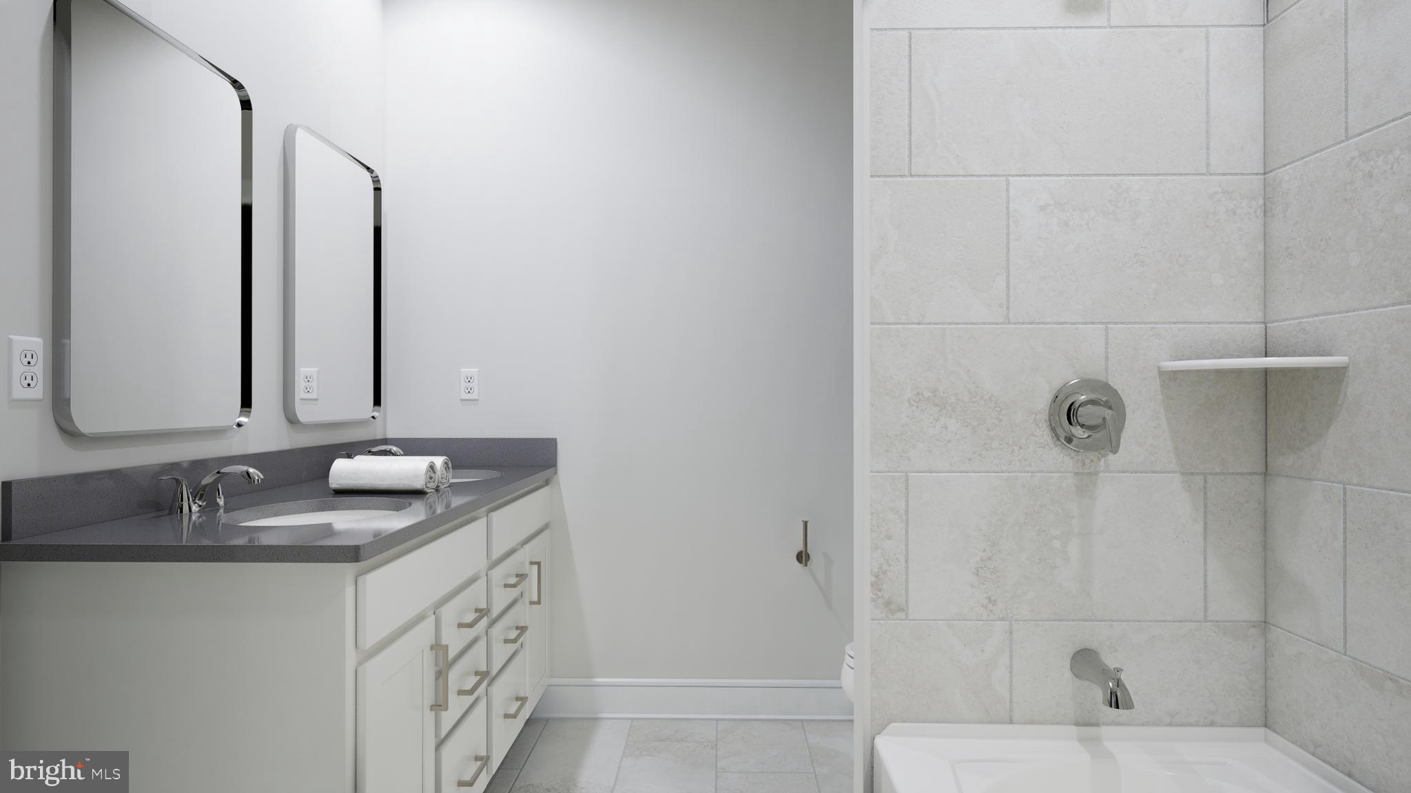 9739 Grant Avenue Manassas, VA 20110 - Photo 16 of 33 a bathroom with a granite countertop sink and a mirror