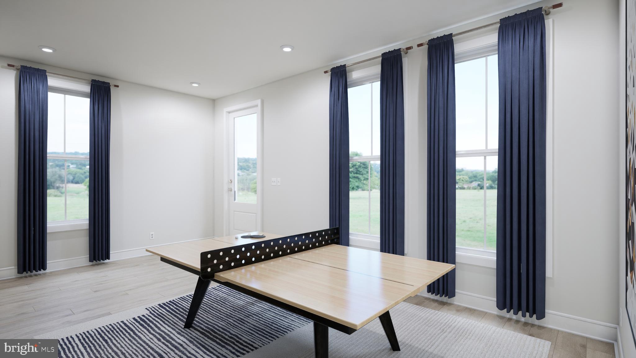 9739 Grant Avenue Manassas, VA 20110 - Photo 20 of 33 a view of a room with furniture and window
