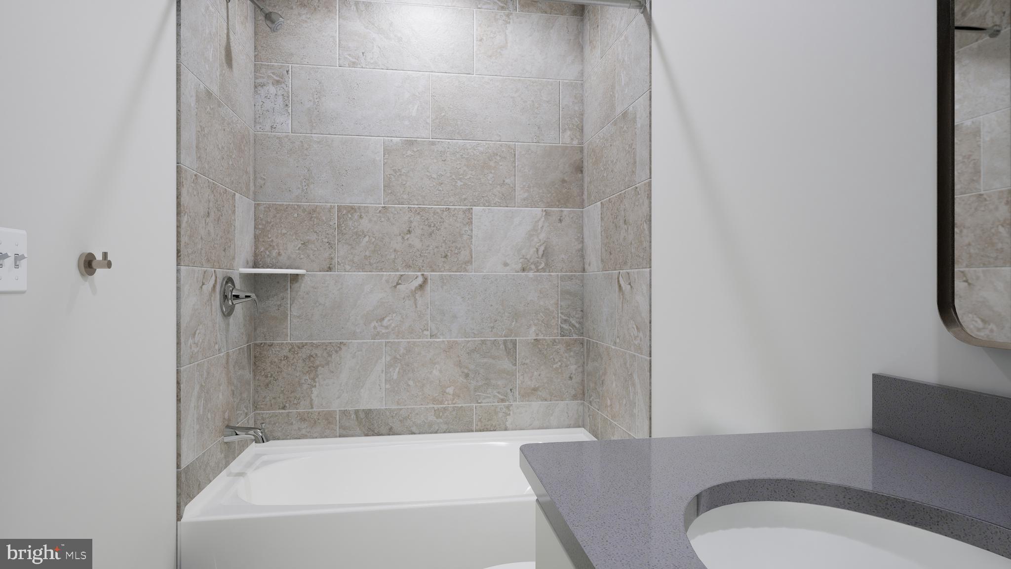 9739 Grant Avenue Manassas, VA 20110 - Photo 23 of 33 a bathroom with a sink and a mirror