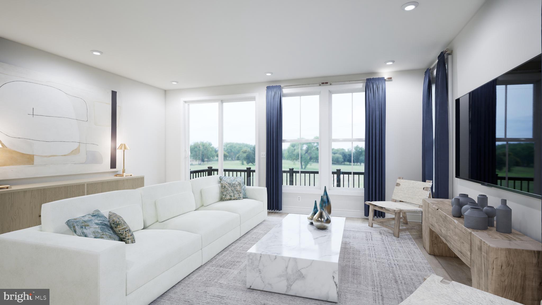 9739 Grant Avenue Manassas, VA 20110 - Photo 7 of 33 a living room with furniture and a flat screen tv