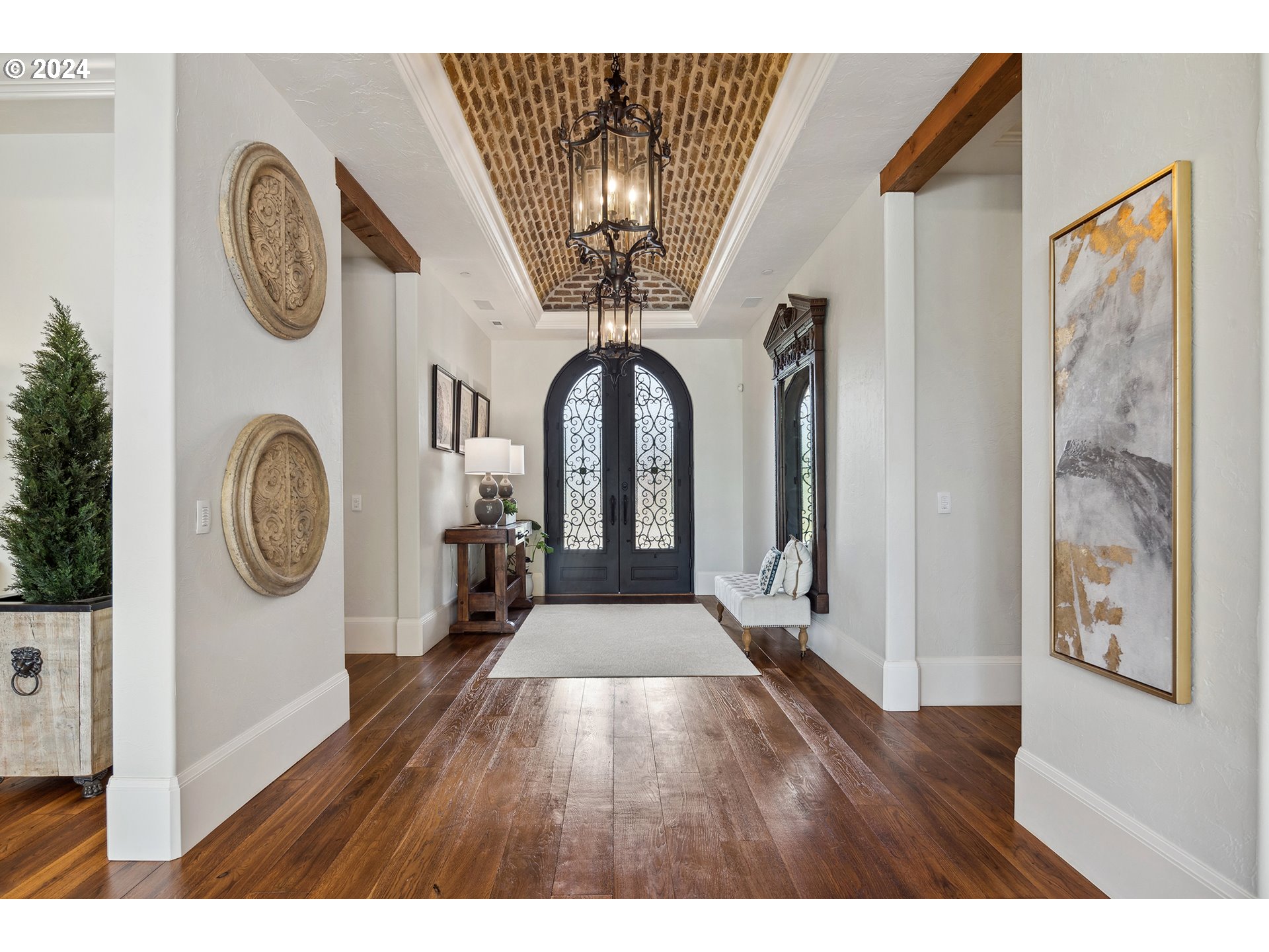 421 Northwest 209th Street Ridgefield, WA 98642 - Photo 2 of 48 a view of a hallway with wooden and a fireplace