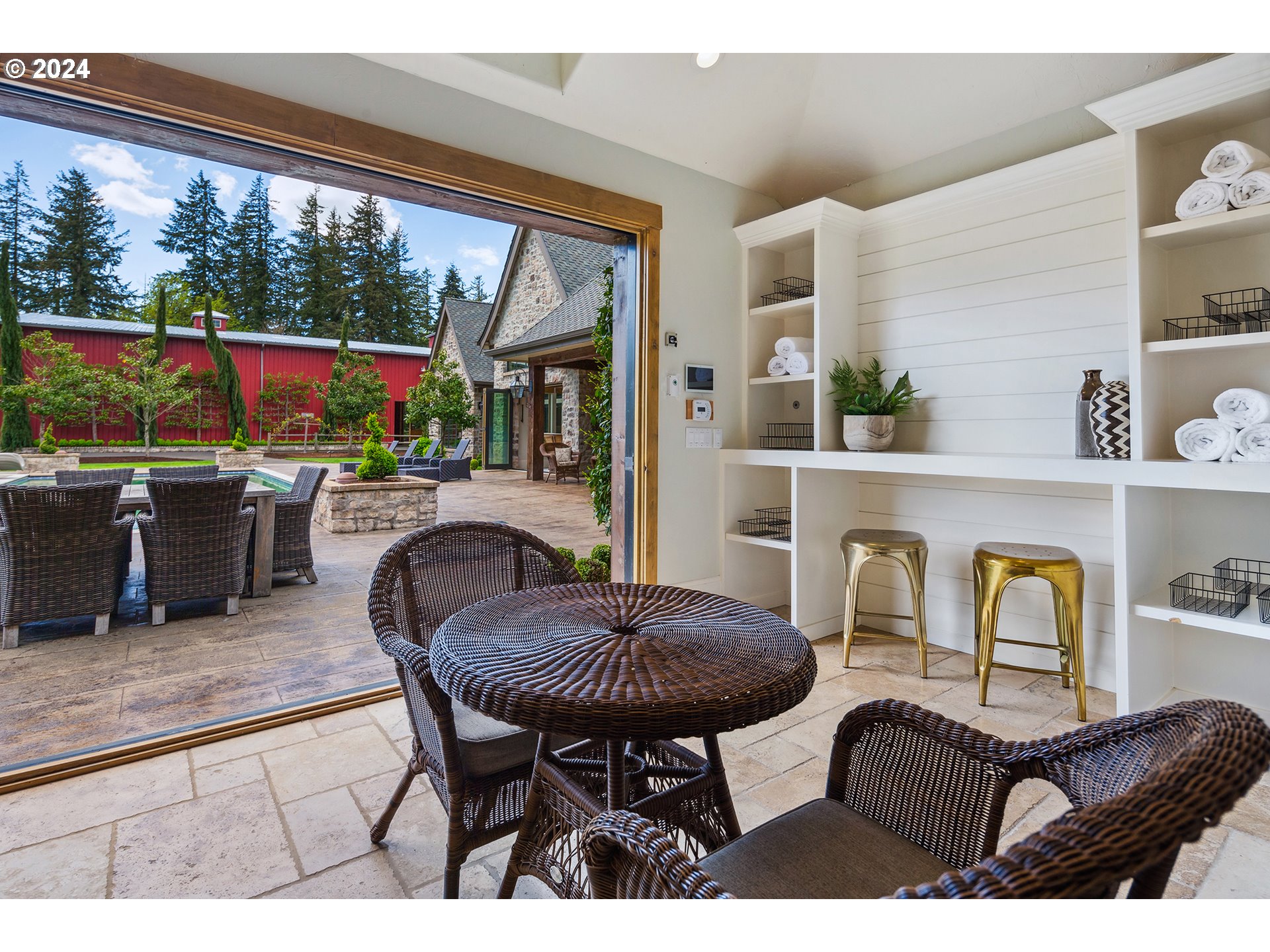 421 Northwest 209th Street Ridgefield, WA 98642 - Photo 22 of 48 a outdoor living space with furniture and a potted plant