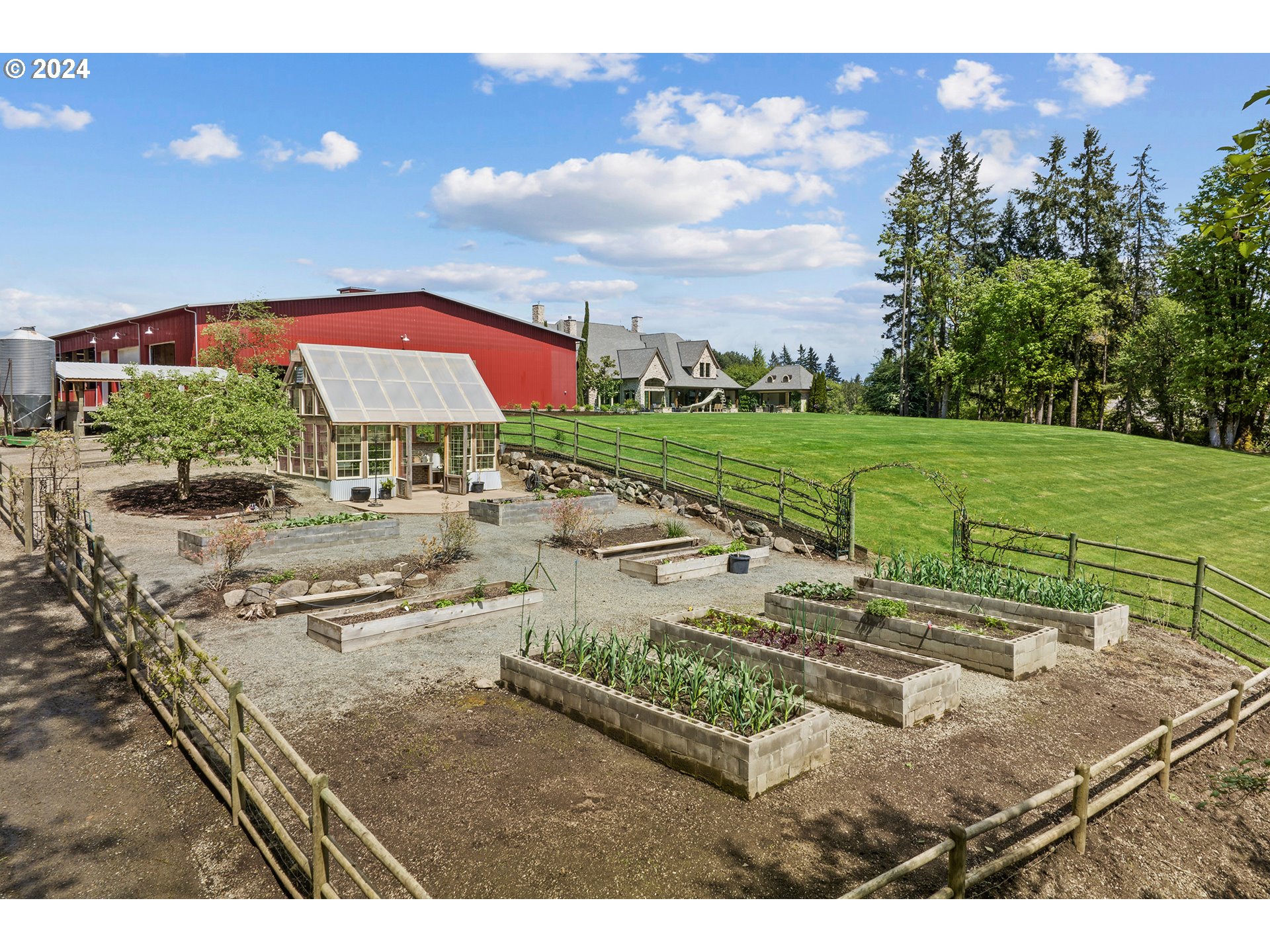 421 Northwest 209th Street Ridgefield, WA 98642 - Photo 33 of 48 a view of a backyard with sitting area