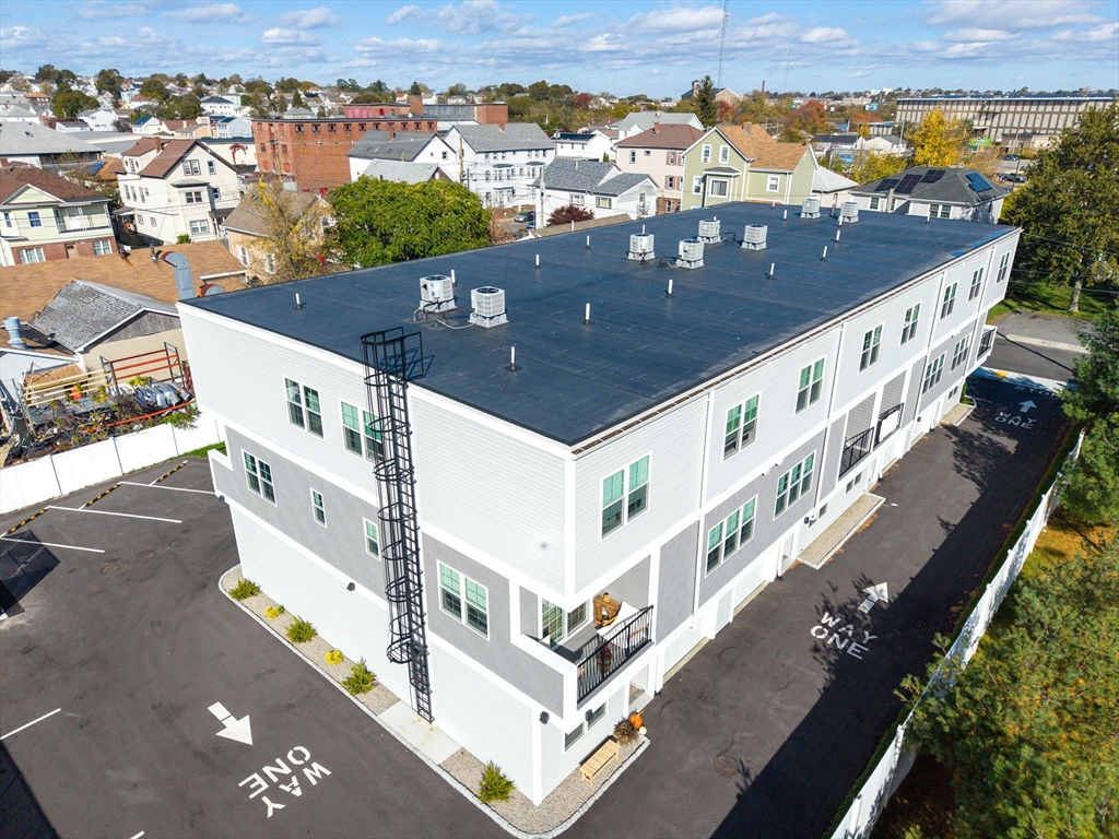 889-895 Grinnell Street, Unit 3 Fall River, MA 02721 - Photo 36 of 39 an aerial view of a balcony