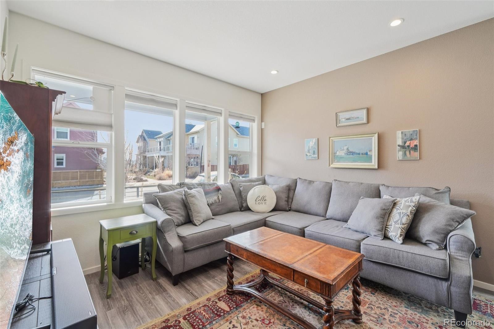 2005 West 66th Avenue Denver, CO 80221 - Photo 11 of 47 a living room with furniture and a large window