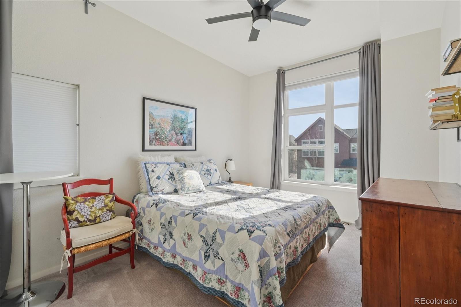 2005 West 66th Avenue Denver, CO 80221 - Photo 30 of 47 a bedroom with a bed and a window