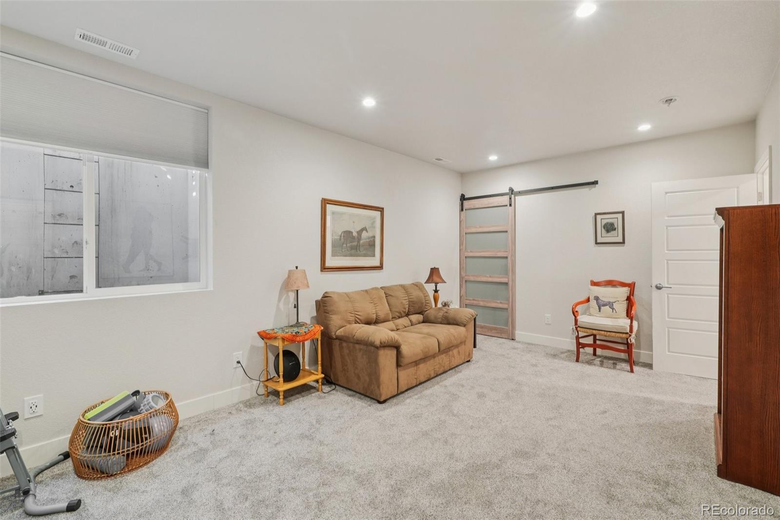 2005 West 66th Avenue Denver, CO 80221 - Photo 38 of 47 a living room with furniture and a window