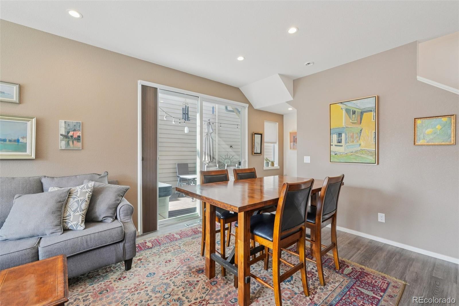 2005 West 66th Avenue Denver, CO 80221 - Photo 8 of 47 a view of a dining room with furniture and wooden floor