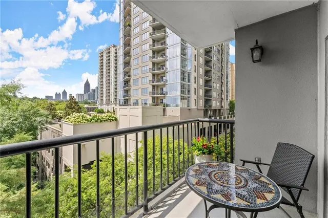 a view of a balcony with lake view and mountain view