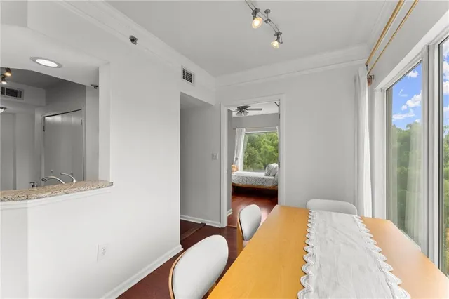 a bedroom with bed and a window