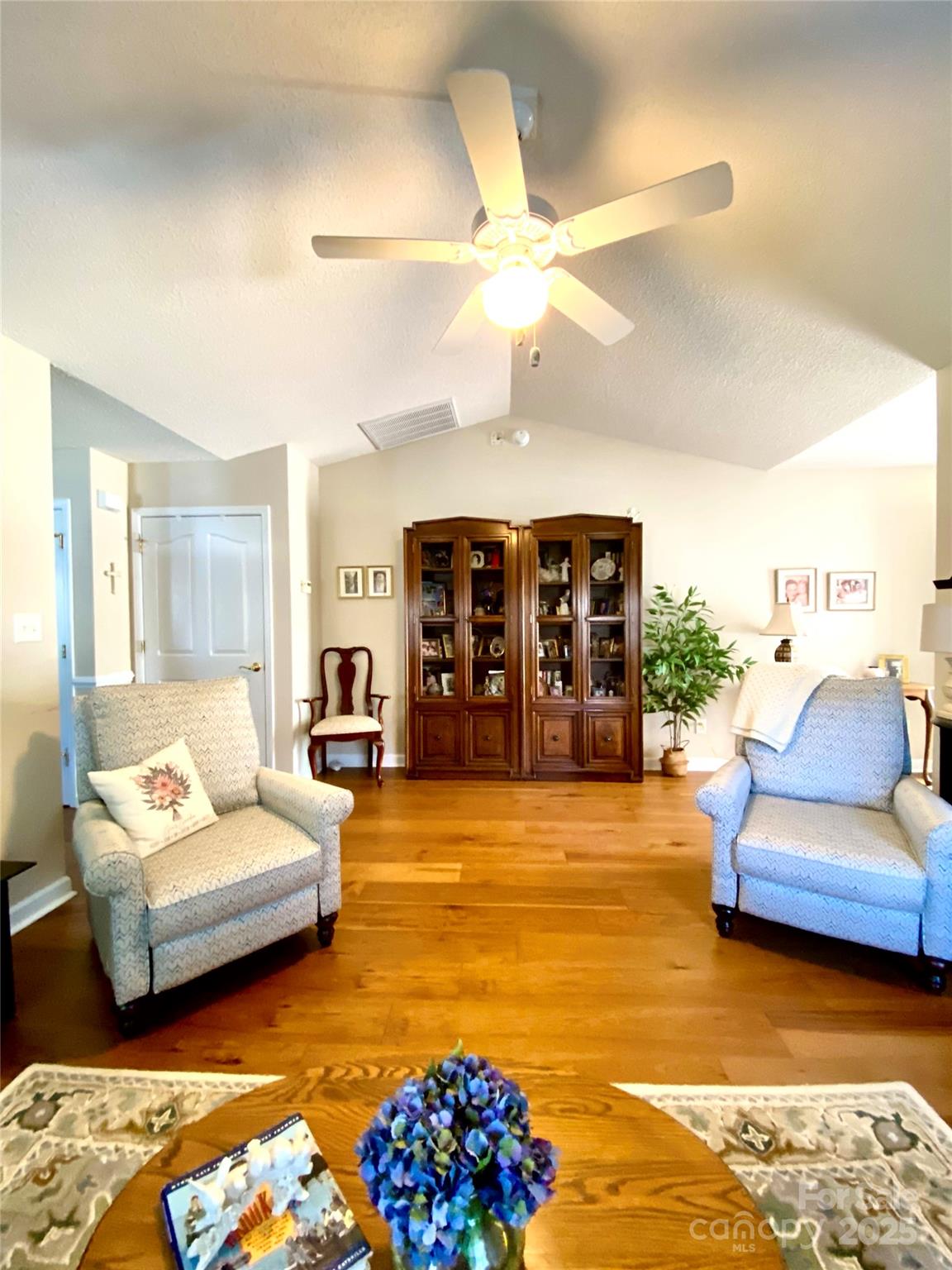 101 Keswick Lane Mooresville, NC 28117 - Photo 15 of 43 a living room with furniture and kitchen view