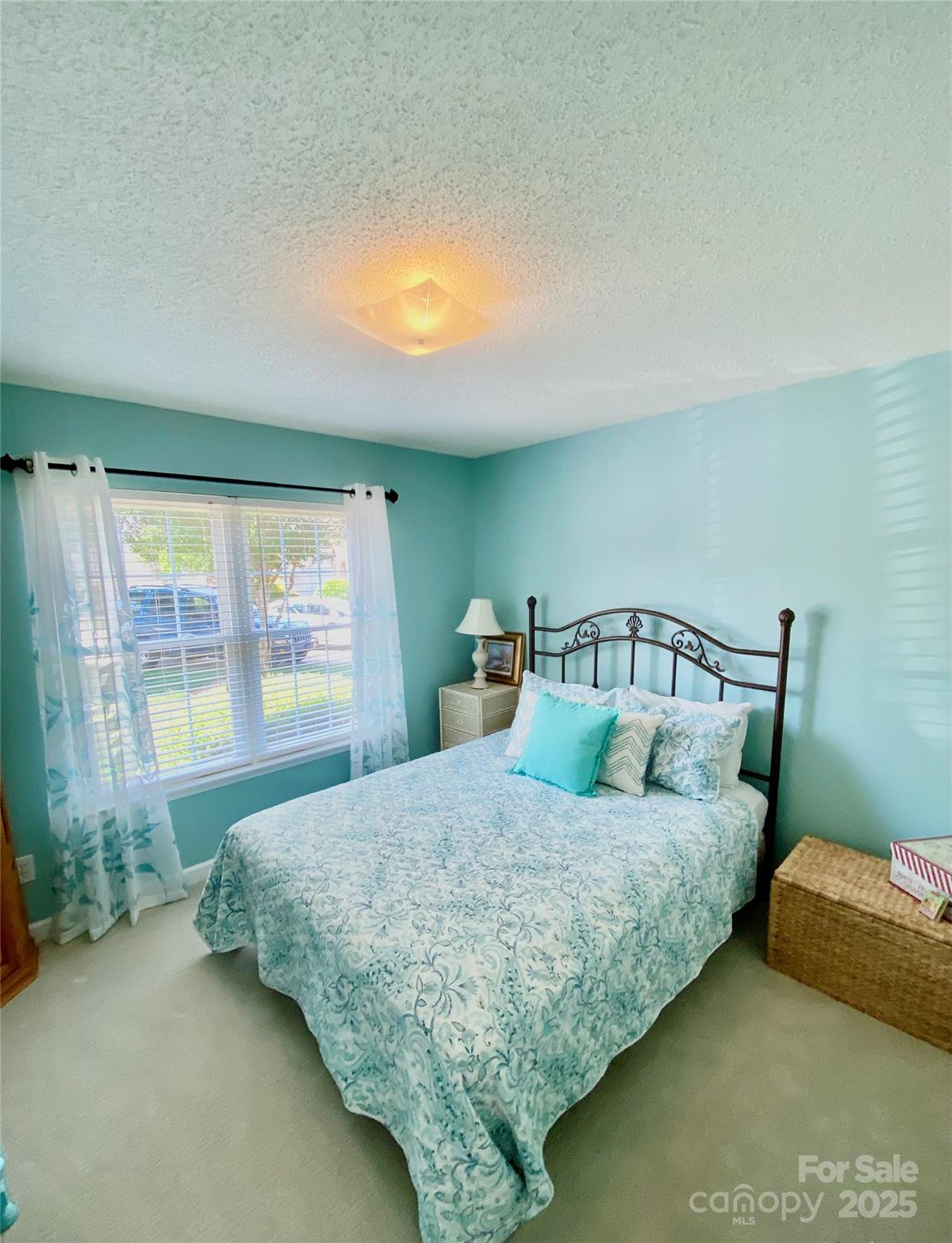 101 Keswick Lane Mooresville, NC 28117 - Photo 25 of 43 a bedroom with a bed next to a window