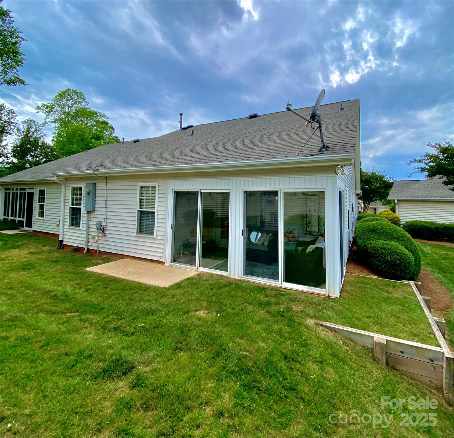 101 Keswick Lane Mooresville, NC 28117 - Photo 34 of 43 a view of a house with a yard and sitting area
