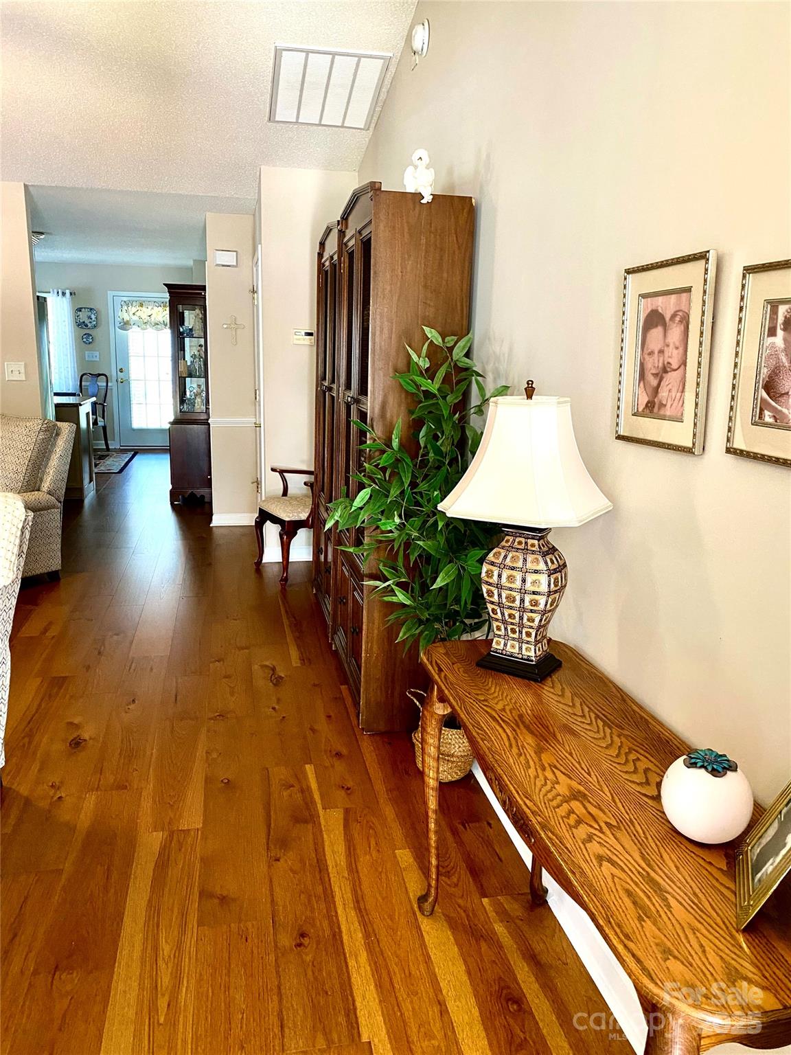 101 Keswick Lane Mooresville, NC 28117 - Photo 7 of 43 a living room with furniture rug and wooden floor